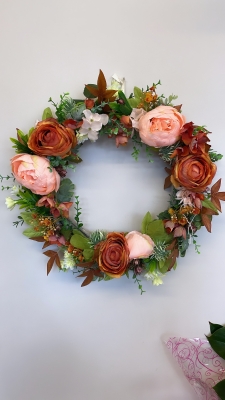 All round orange door wreath